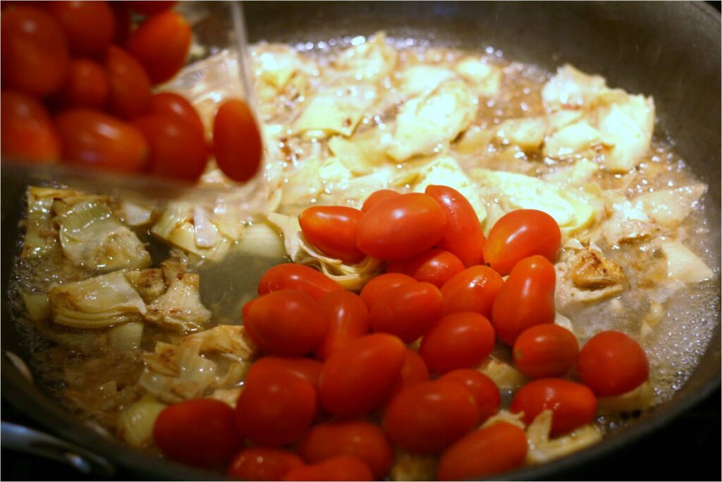 Add Chicken Broth and Grape Tomatoes