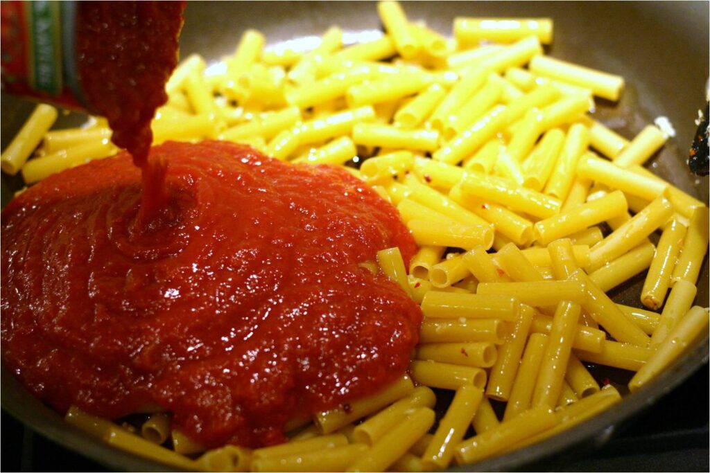 Add Crushed Tomatoes to Ziti Pasta