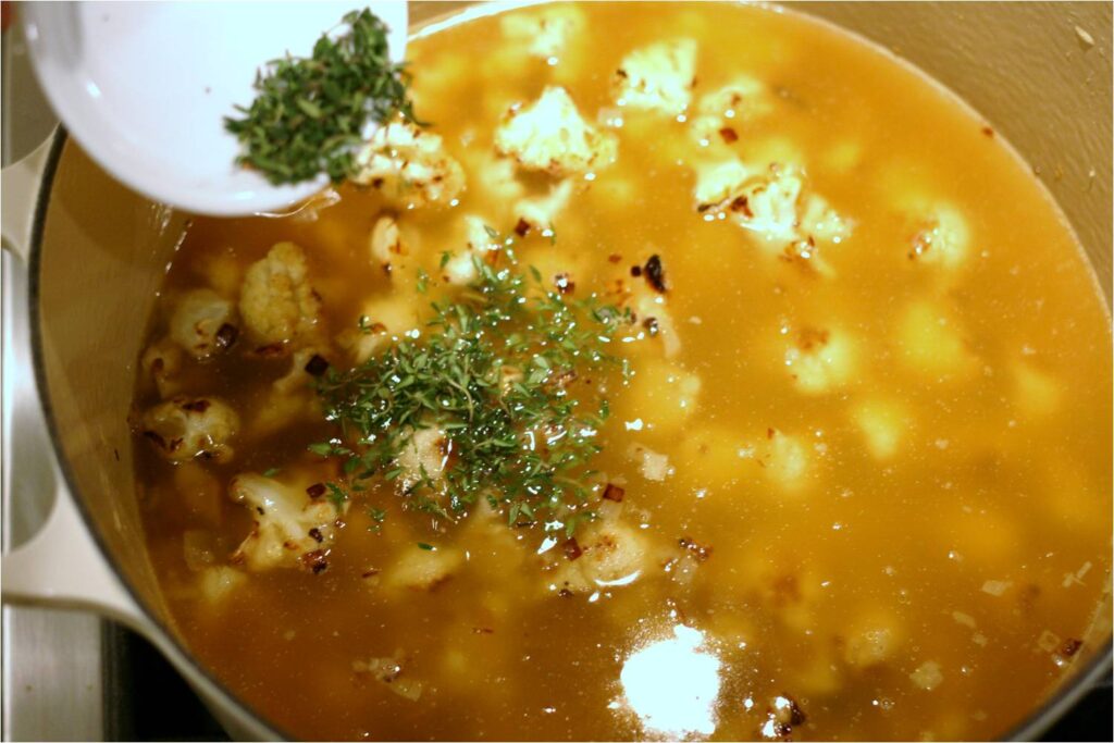 Add thyme to cauliflower soup