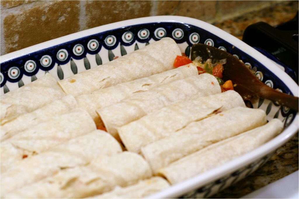 Arrange Fish Enchiladas in Bake Pan