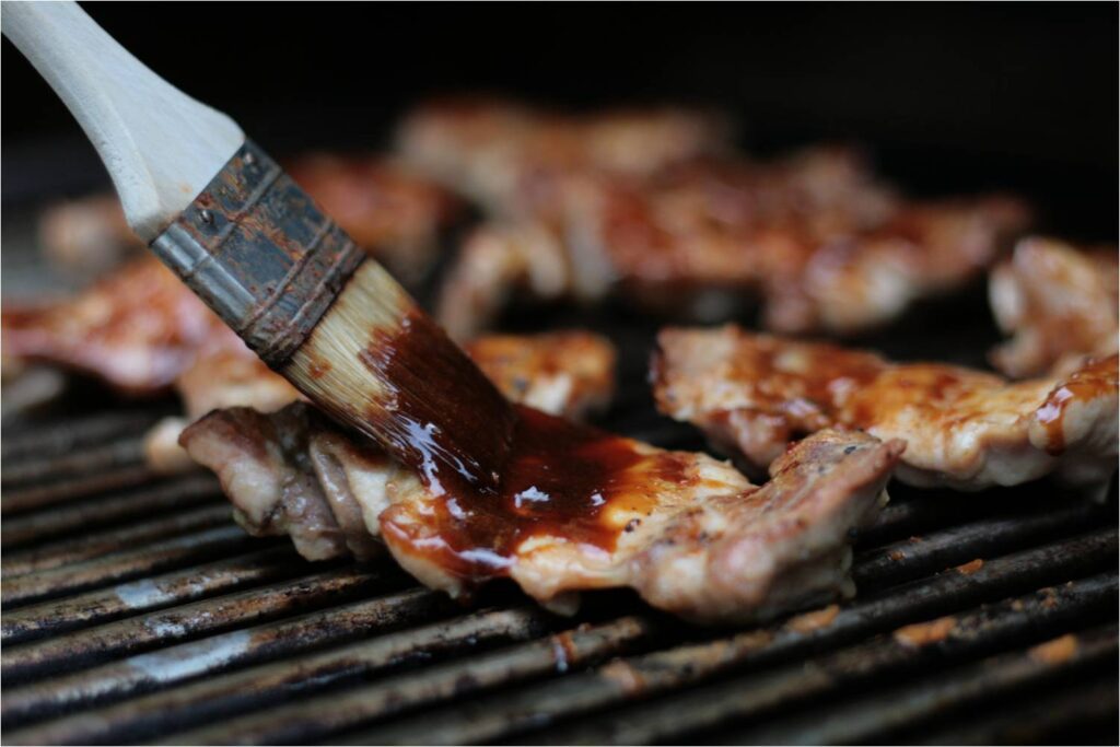 Baste Chicken on Grill