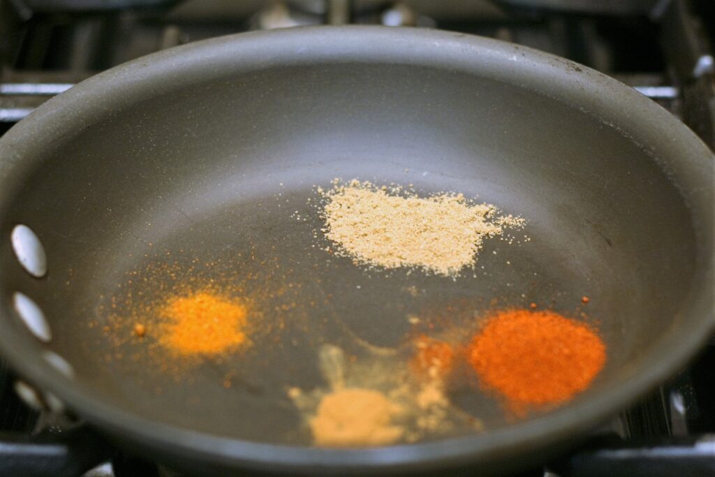 Bloom spices for Moroccan Carrots