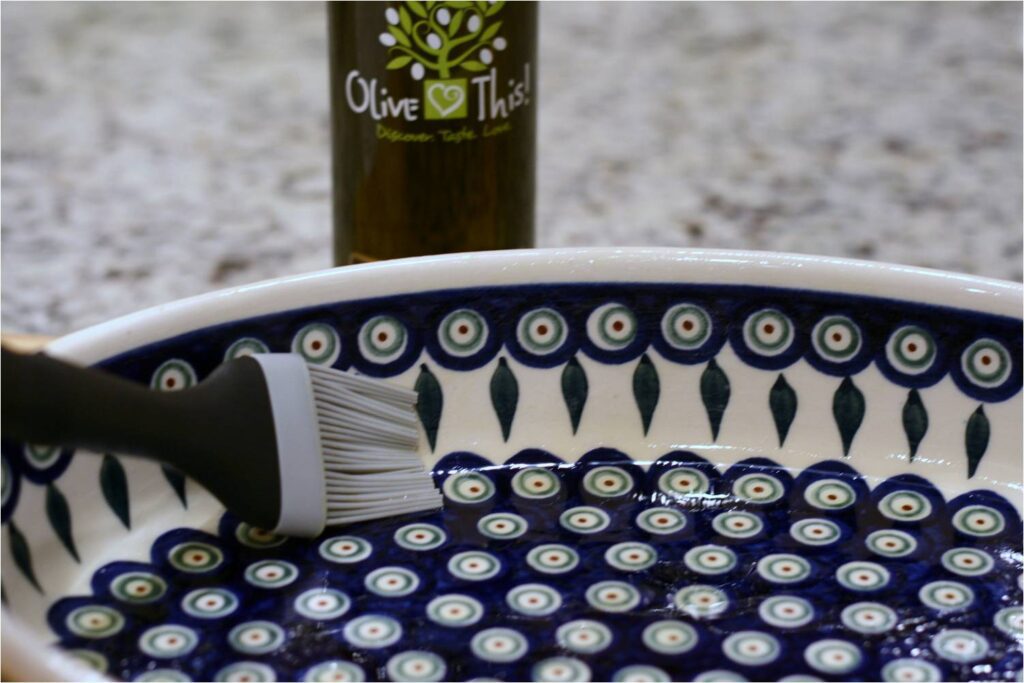 Brush casserole dish with oil