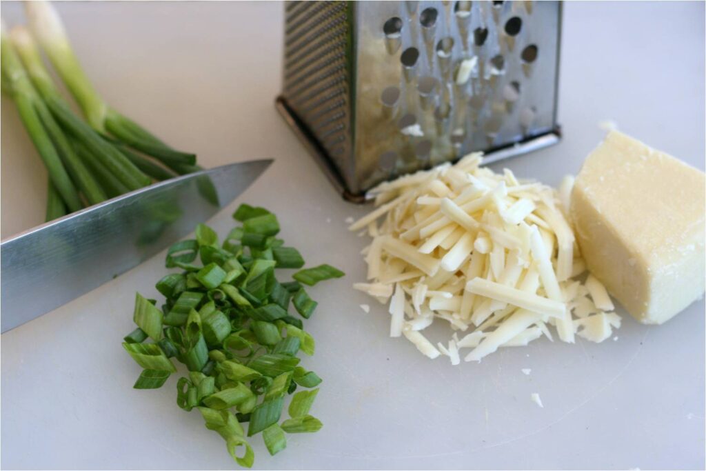 Chop Scallions and Grate Gruyere Cheese