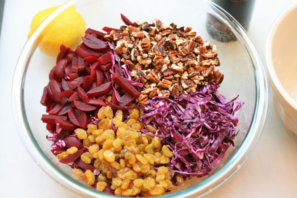 Combine all ingreds for cabbage beet slaw