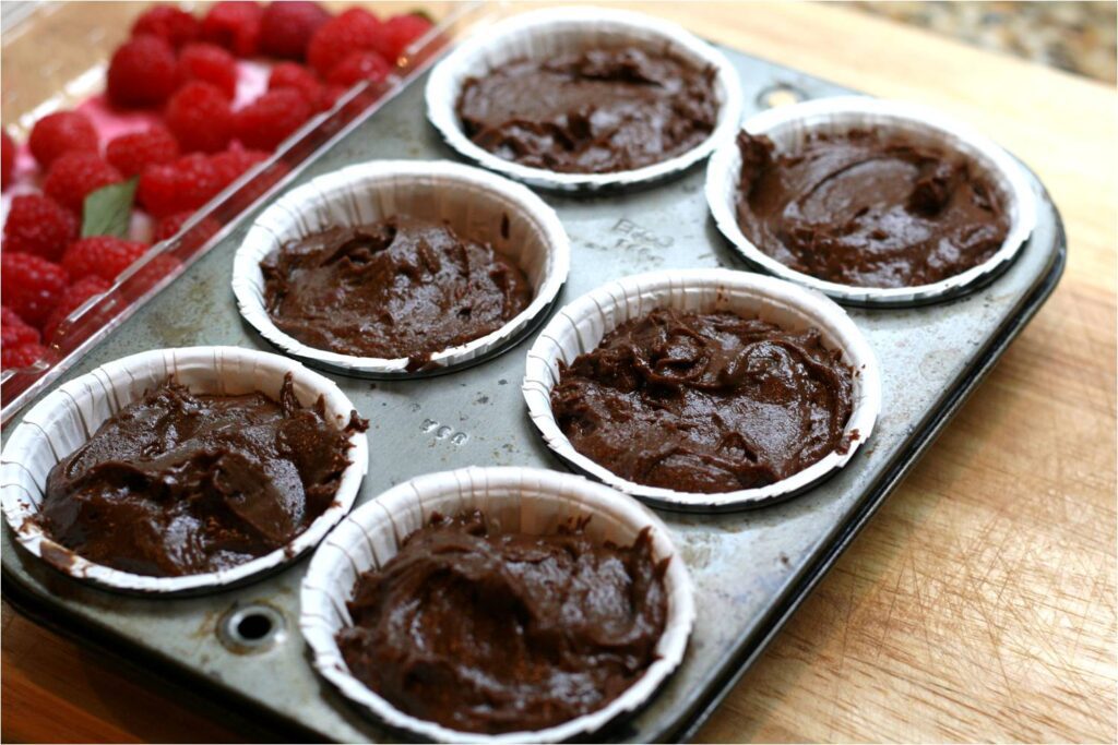 Cover raspberries with additional batter