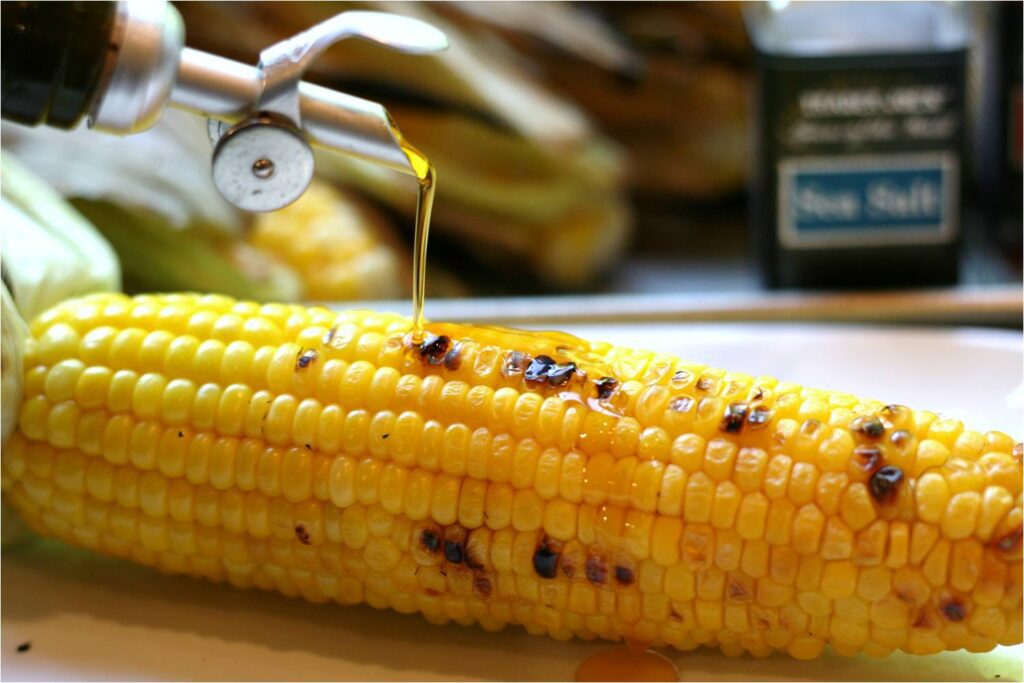 Drizzle EVOO on Grilled Corn on Cob