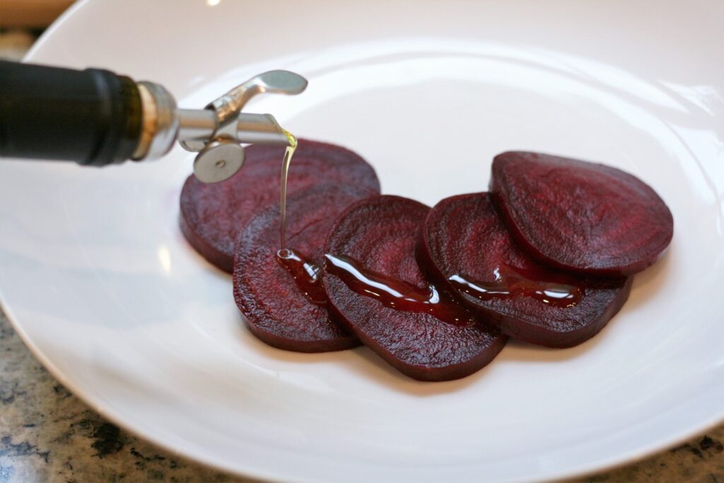 Drizzle EVOO on sliced beets