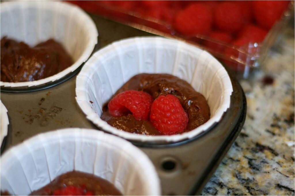 Insert two raspberries