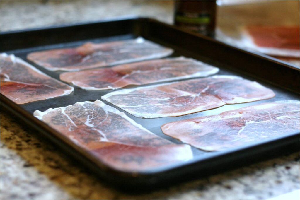 Lay Prosciutto on Rimmed Baking Sheet