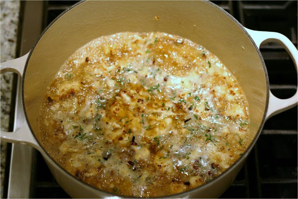 Let Cauliflower Fennel EVOO soup ingredients simmer