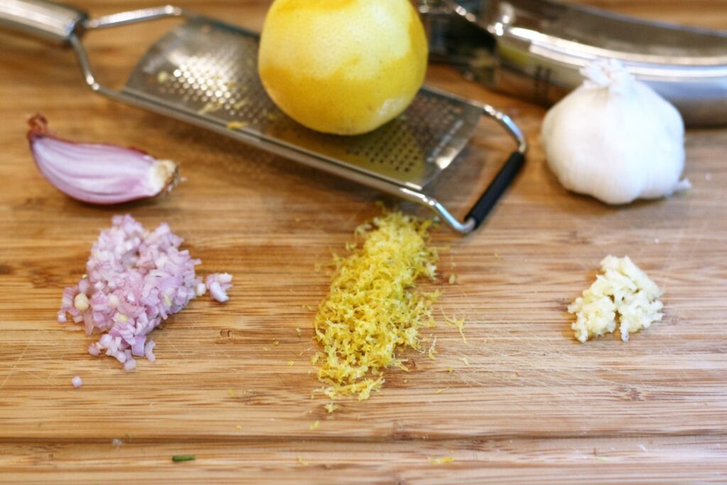 Mince shallot zest lemon and mince garlic clove