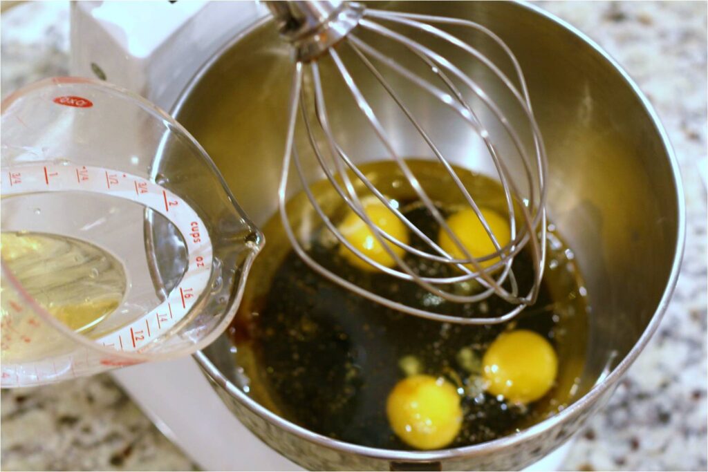 Mix Wet Ingredients and Sugars for Zucchini Carrot Gingerbread Cake