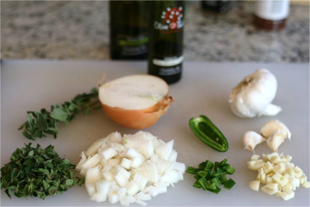 Prep onions and herbs for slow roasted pork