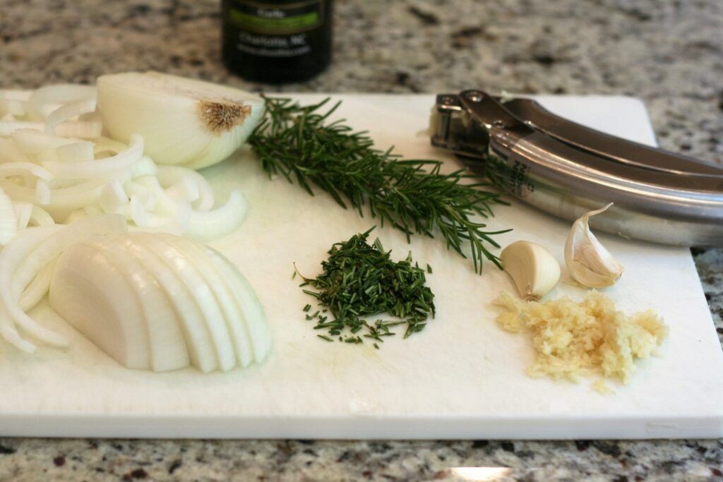 Prepare garlic rosemary and onions for Lamb Chops