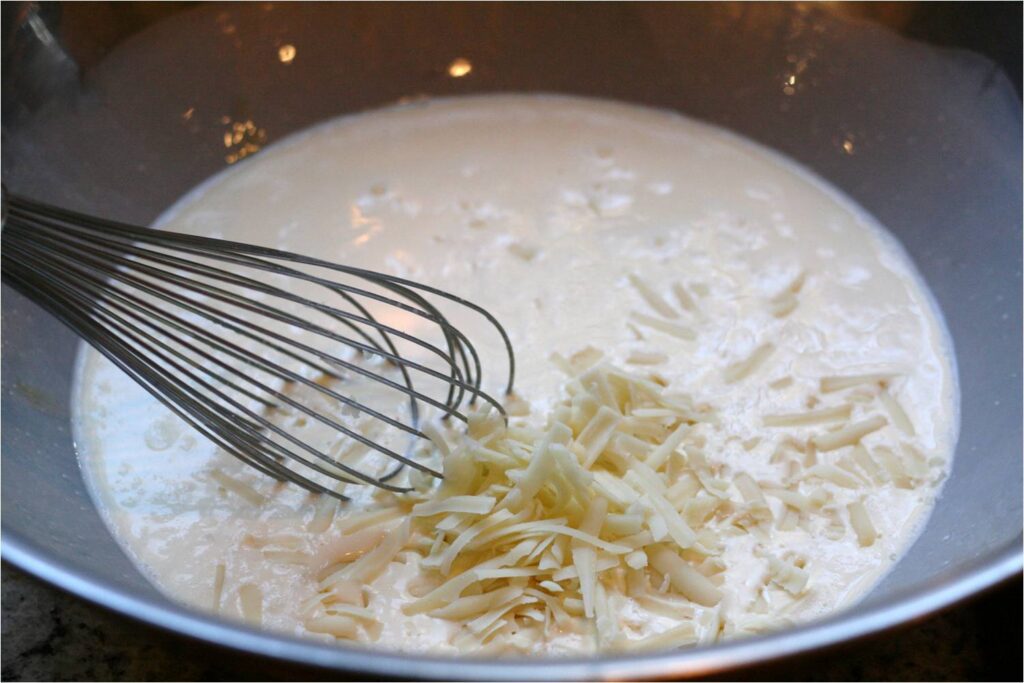 Prepare stock cheese and cream for mush leek bread pudding