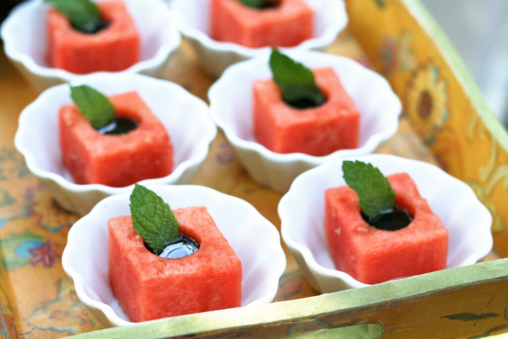 Prepared melon cubes with balsamic