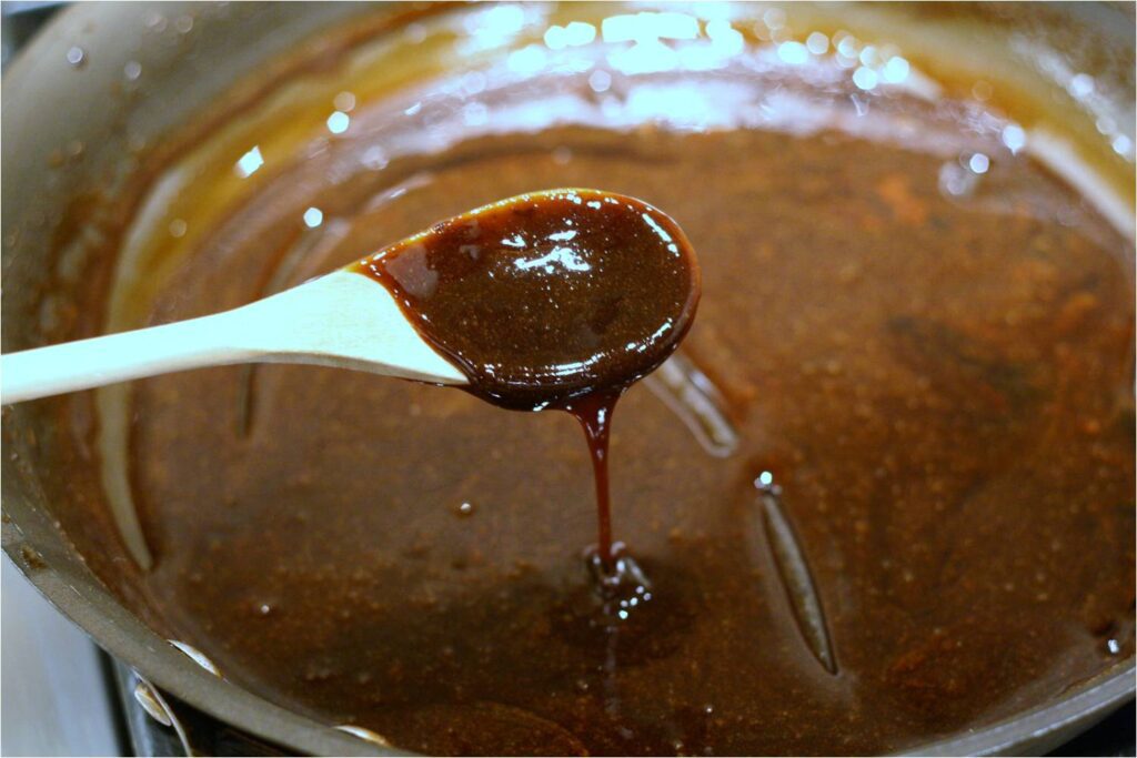 Reduce balsamic chicken wings marinade to a glaze