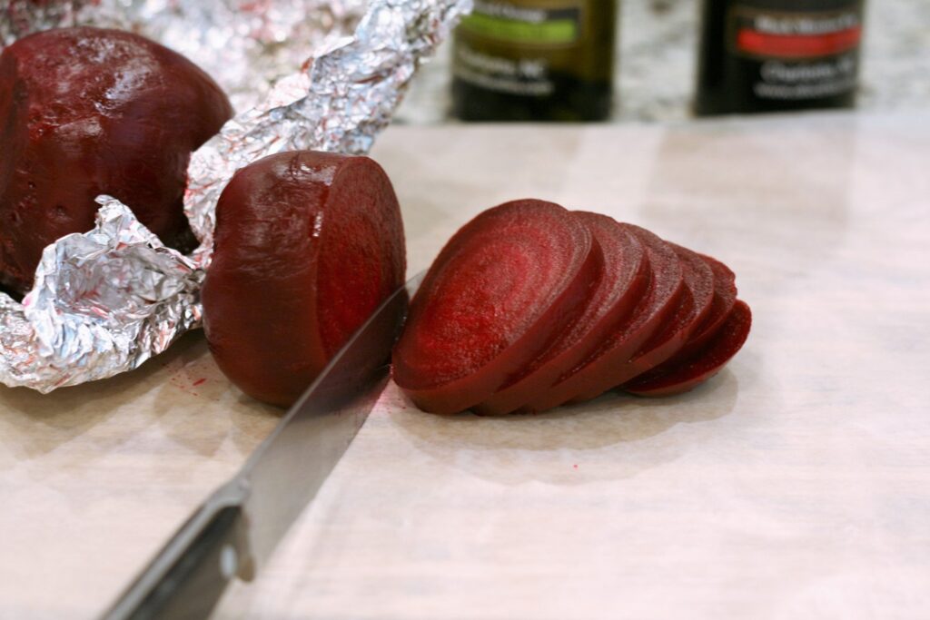 Slice roasted beets