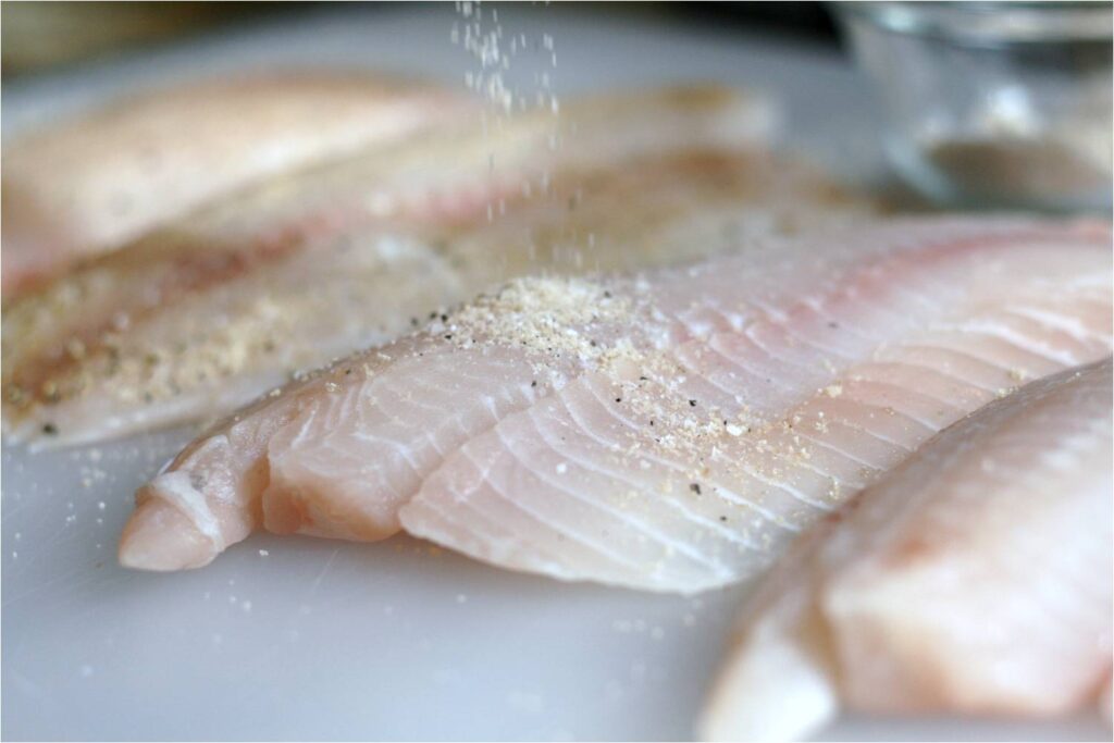 Sprinkle Talapia with Cornstarch Mixture
