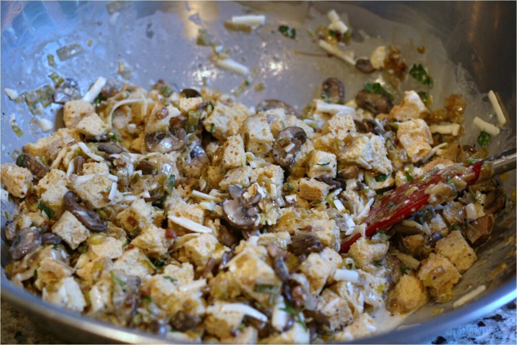 Stir mushroom leek bread pudding mixture and let sit