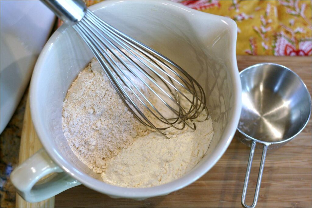 Whisk Dry Ingreds for Banana Walnut Muffings