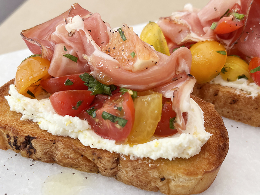 Image of how assembled tomato bruschetta should look